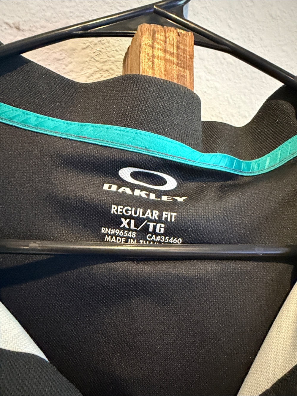 Oakley Black Polo with Teal Diagonal Graphic - Picture 2 of 4
